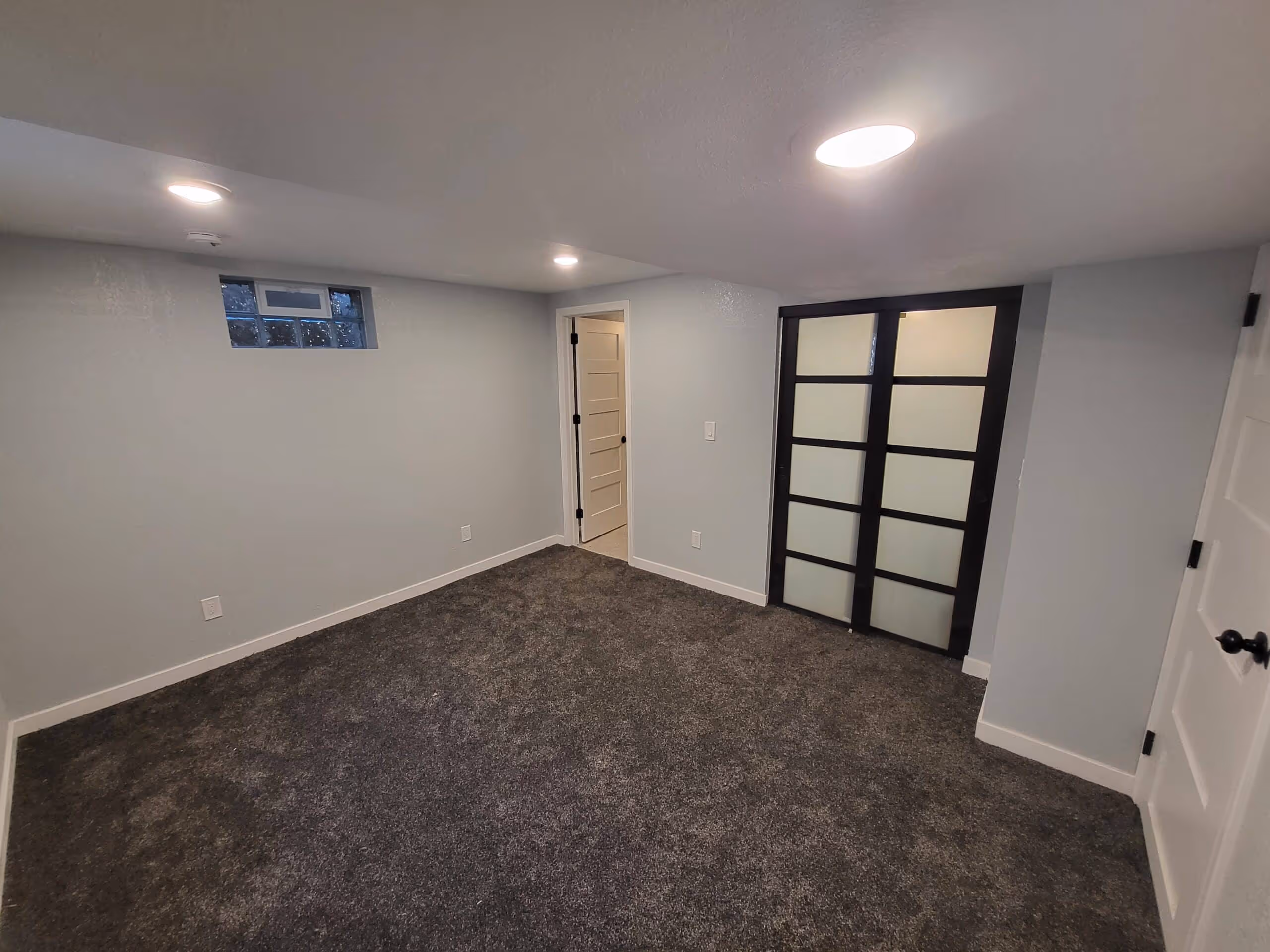 Custom built-in desk and bookcase unit in a home office or living area.