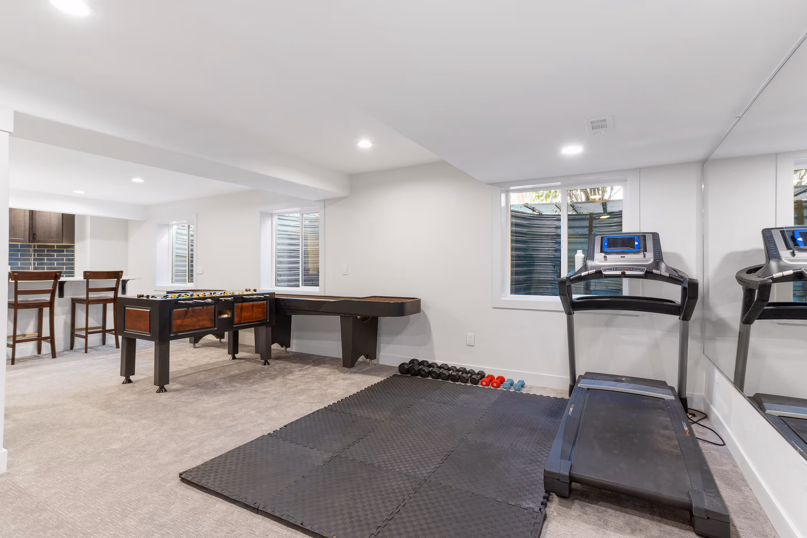 Basement bedroom with a bed