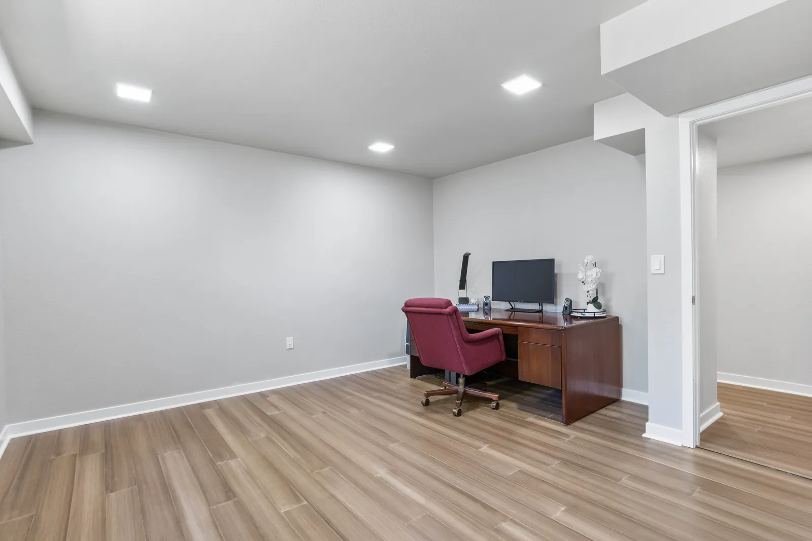 Finished basement office with LVP flooring, Centennial remodel