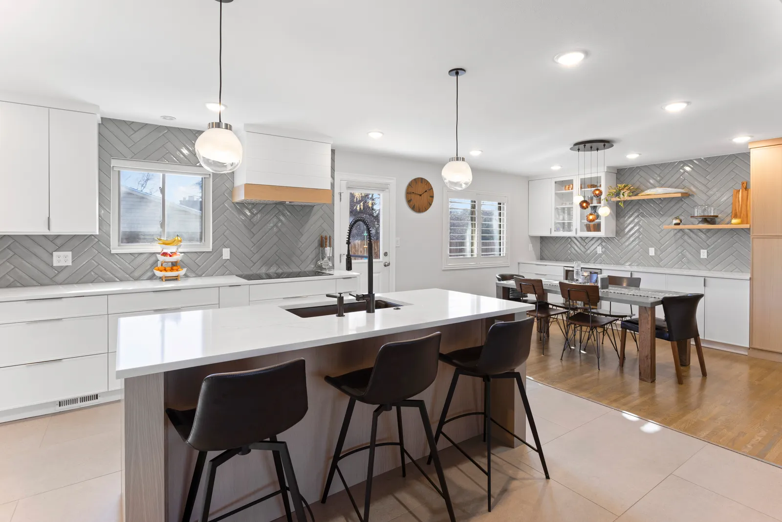 Kitchen island open to dining area in a Centennial kitchen renovation