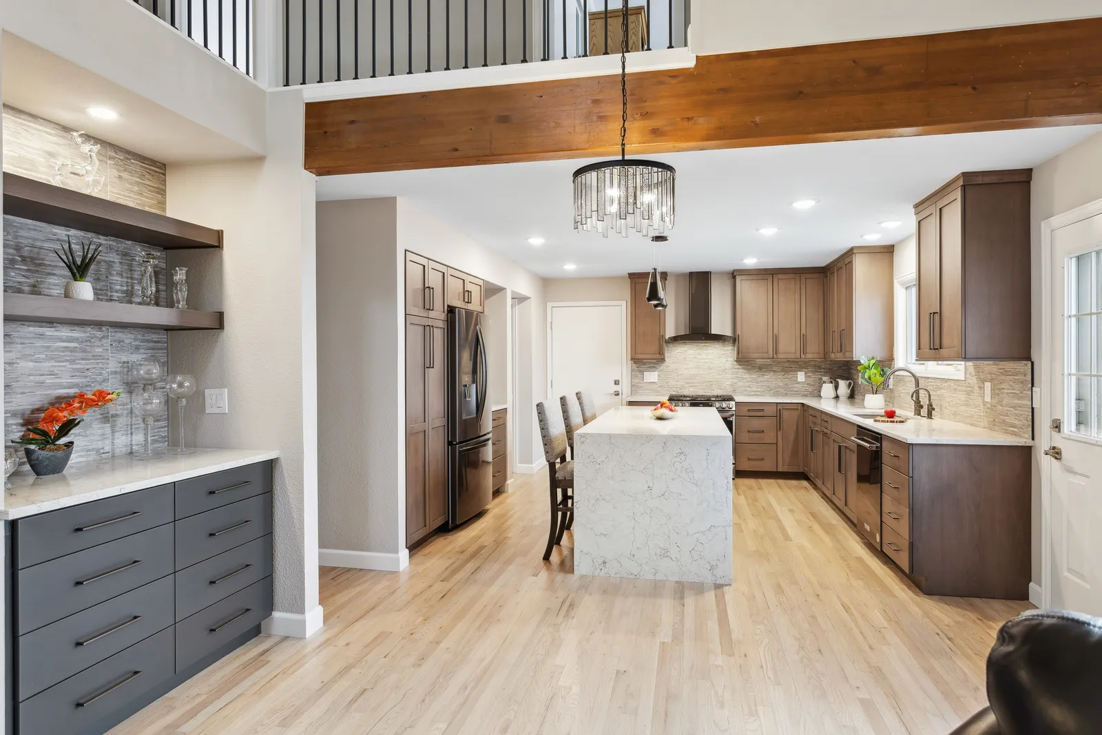 Open kitchen with wood ceiling beam, Stoney Brook Denver remodel