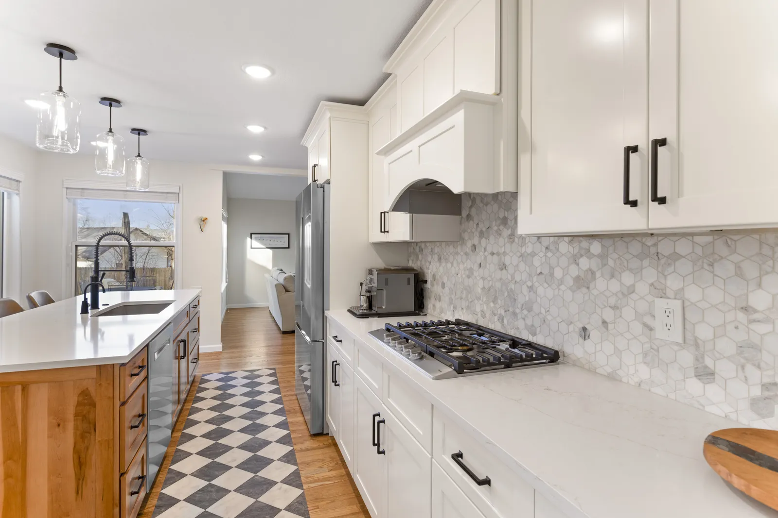 Checkerboard tile floor in a two-tone Englewood kitchen