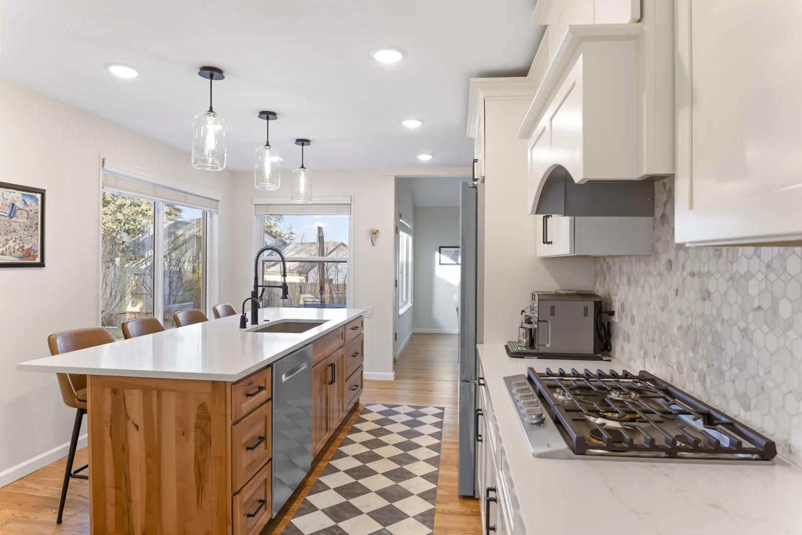 Kitchen island with bar seating and pendants, Englewood CO