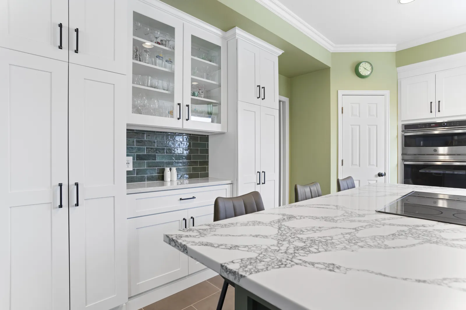 White shaker cabinets with glass-front uppers, Highlands Ranch kitchen