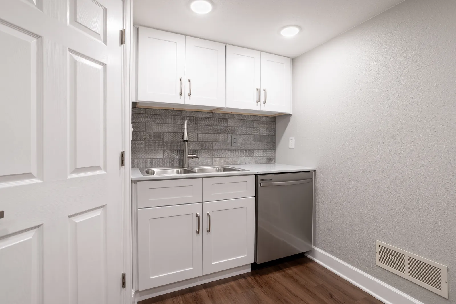 Compact basement kitchenette with sink and dishwasher, Centennial CO