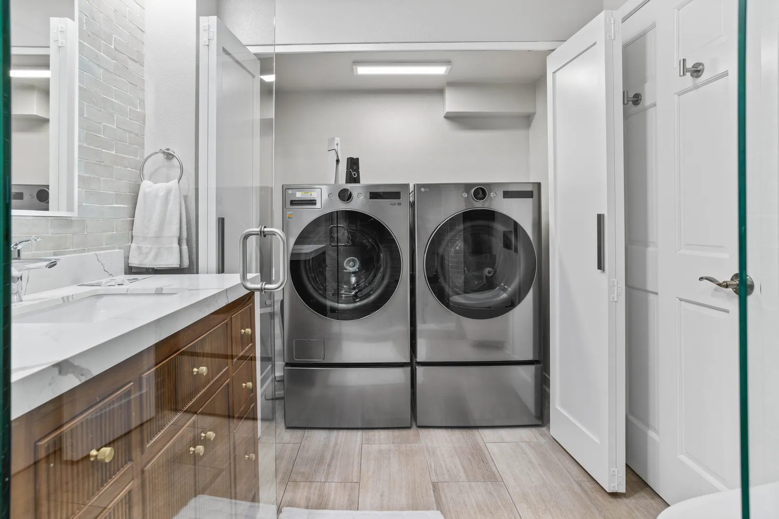 Custom laundry cabinetry with folding counter, Centennial remodel