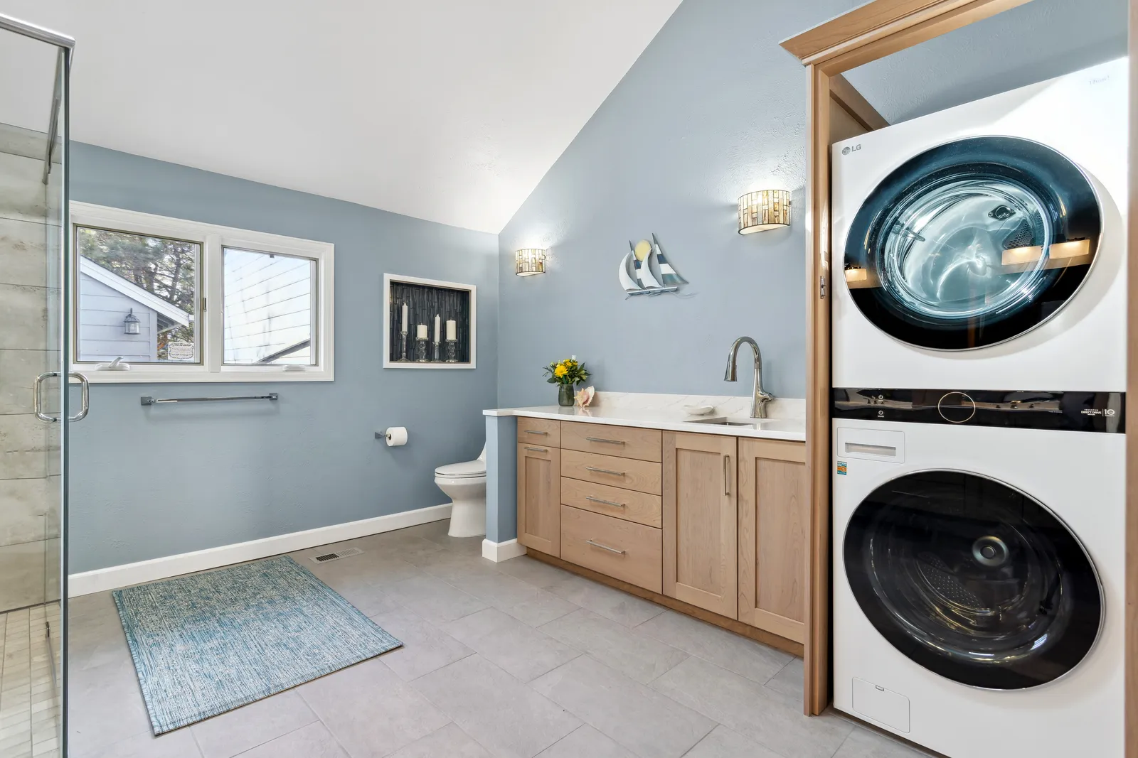 Vaulted master bath with skylight and stacked laundry, Denver CO