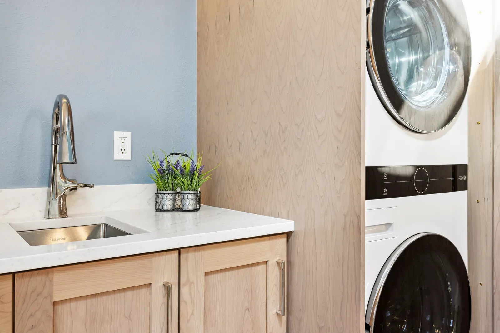 Oak vanity with integrated laundry, remodeled Denver master bath