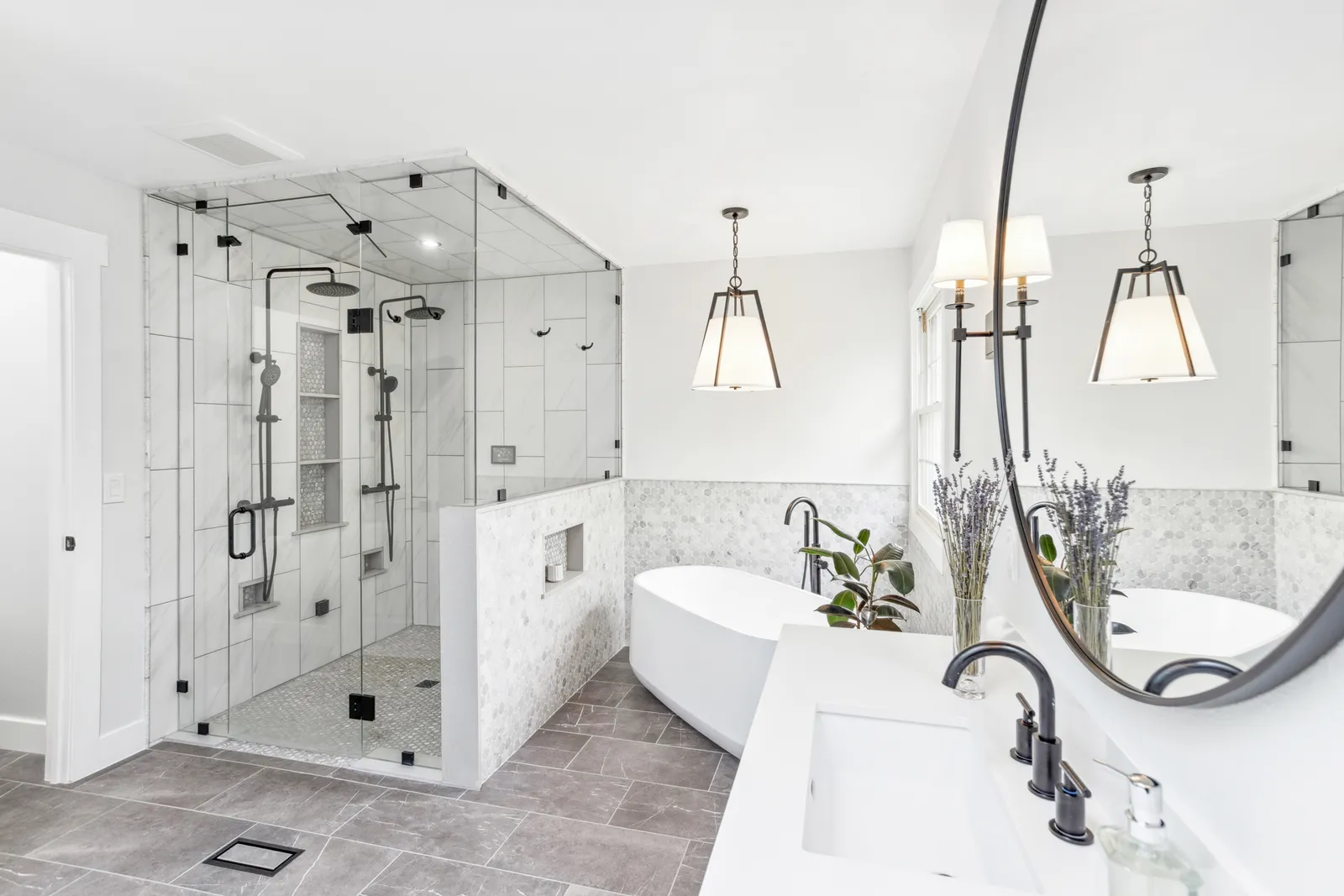 Freestanding tub against marble hex tile, Englewood master bath