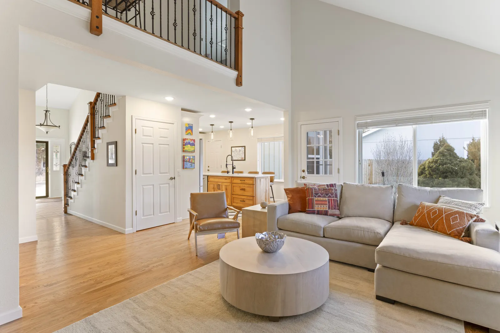 Vaulted living room with loft and stone fireplace, Englewood CO