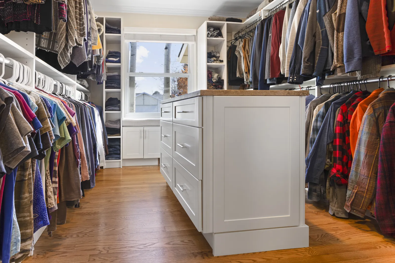 Walk-in closet built-ins with wood-topped island, Englewood CO
